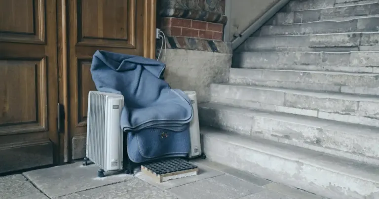 Moving items at the foot of an apartment building staircase